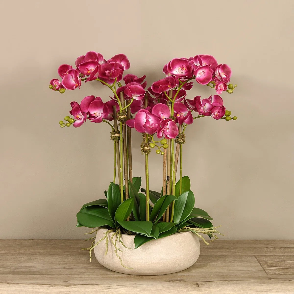 Artificial pink orchid centerpiece arrangement in beige planter-1