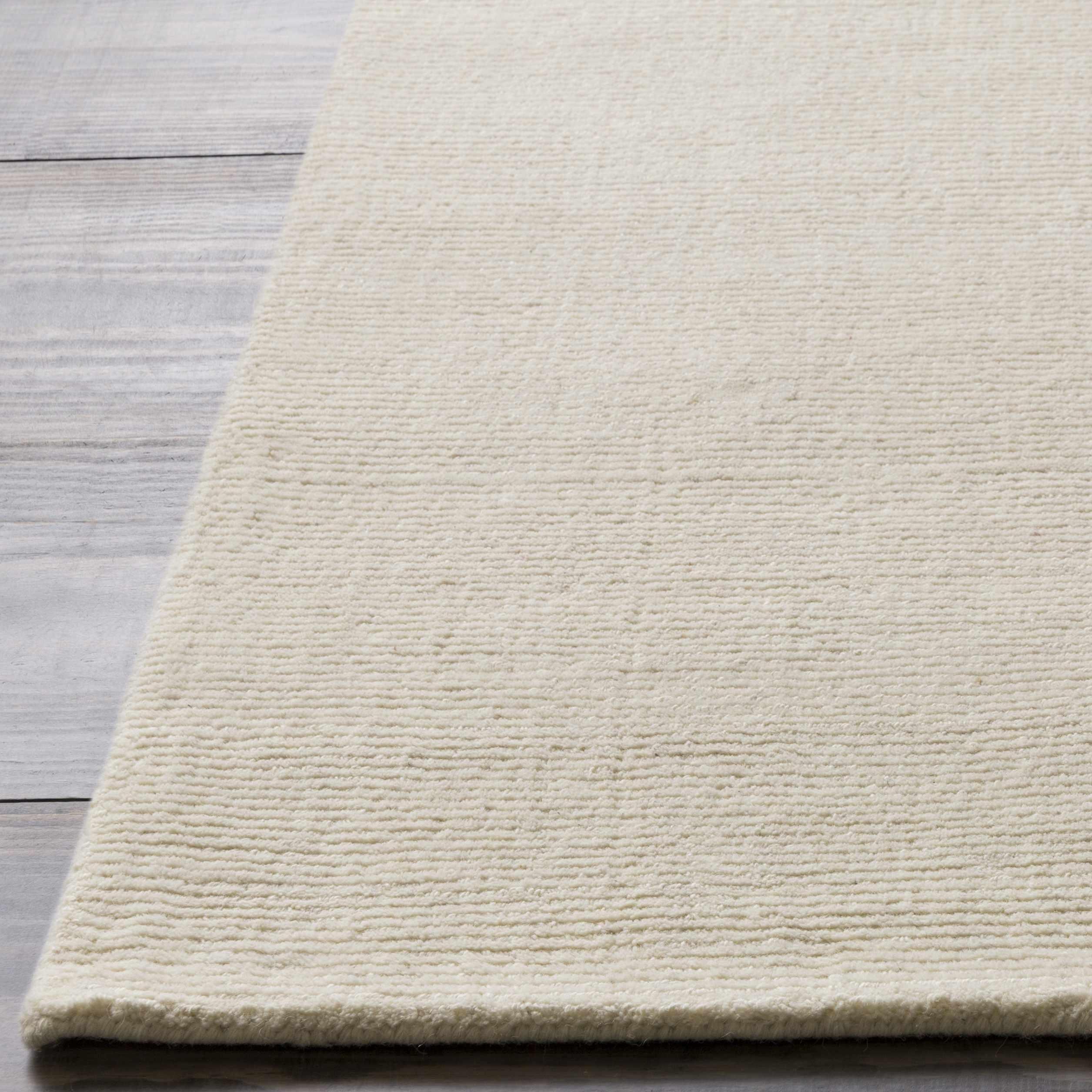 Brockton Solid Wool Light Beige Area Rug - PRHOMZ