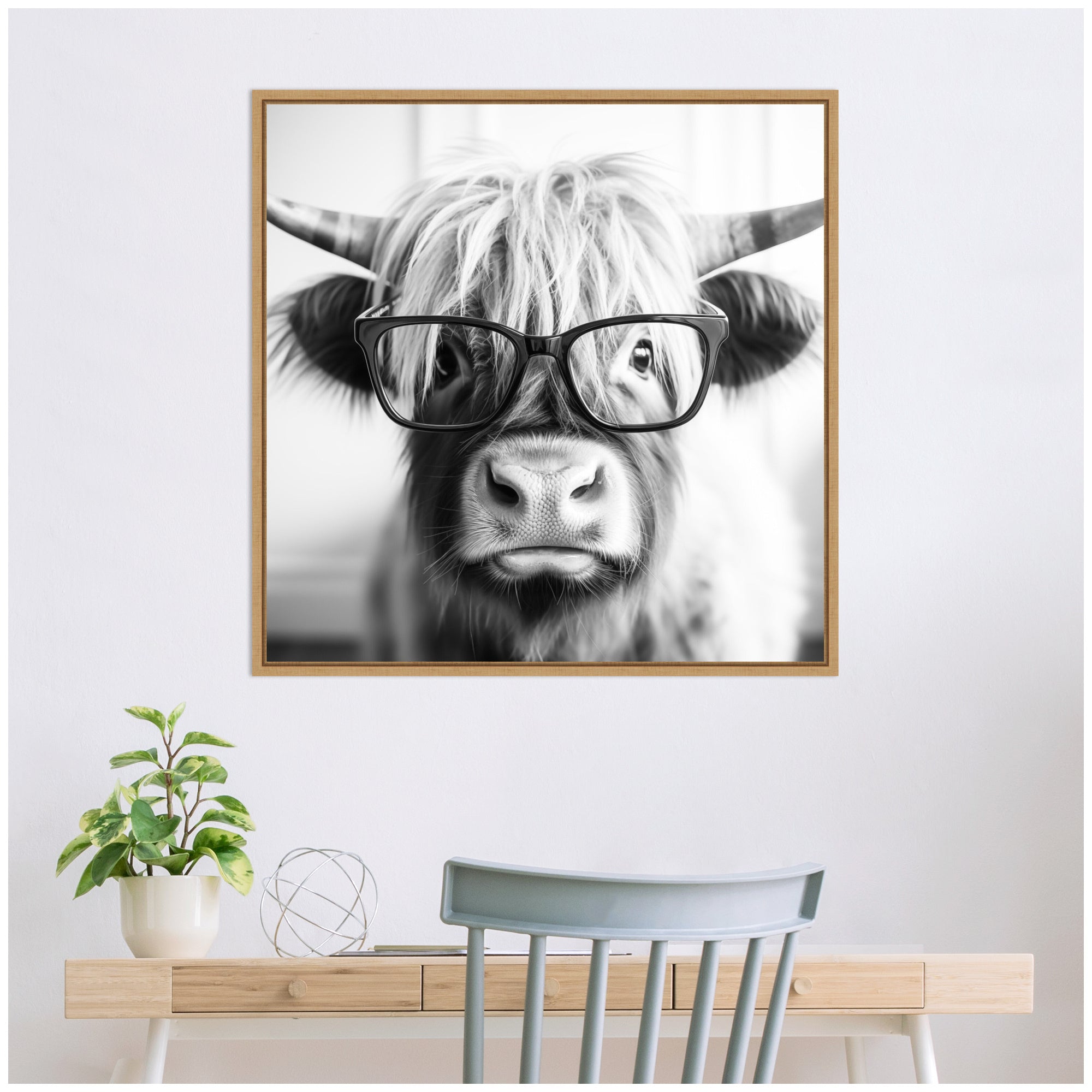 Sylvie Black and White Highland Cow in Reading Glasses Framed Canvas by The Creative Bunch Studio