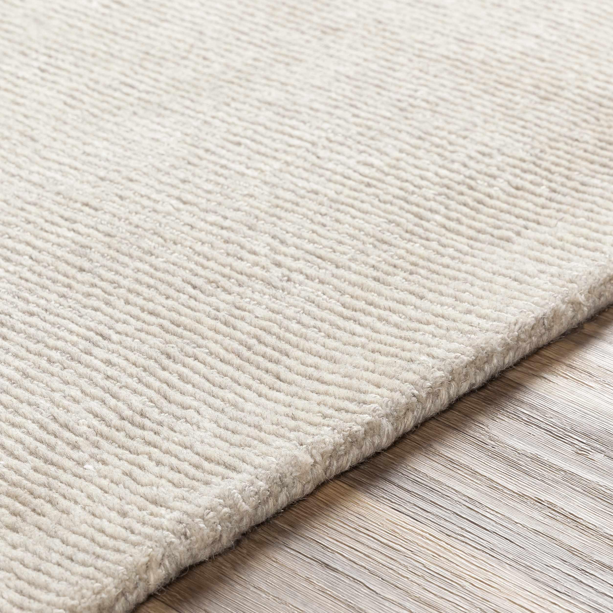 Mariba Ivory Wool Area Rug - PRHOMZ