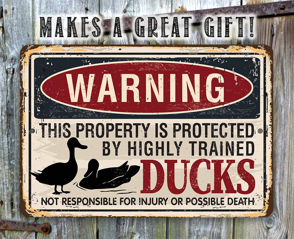 Warning Property Ducks - Metal Sign