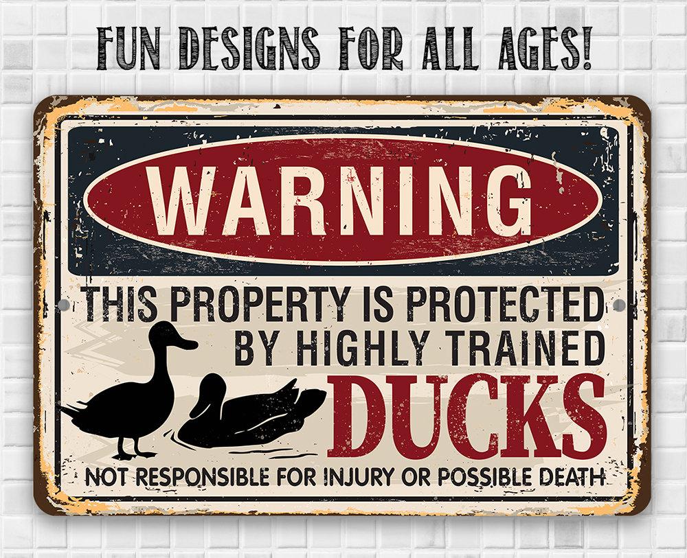 Warning Property Ducks - Metal Sign
