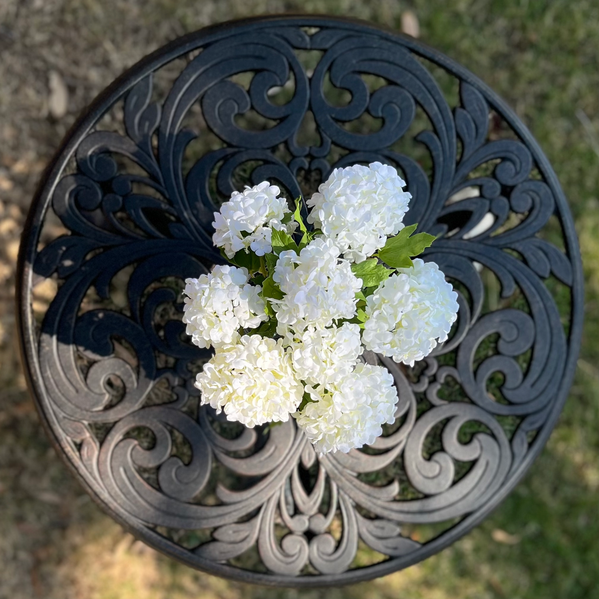 Real touch white hydrangea arrangement in glass vase - 8"