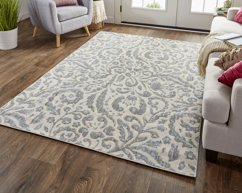 5' X 8' Blue Ivory And Tan Floral Distressed Stain Resistant Area Rug-4