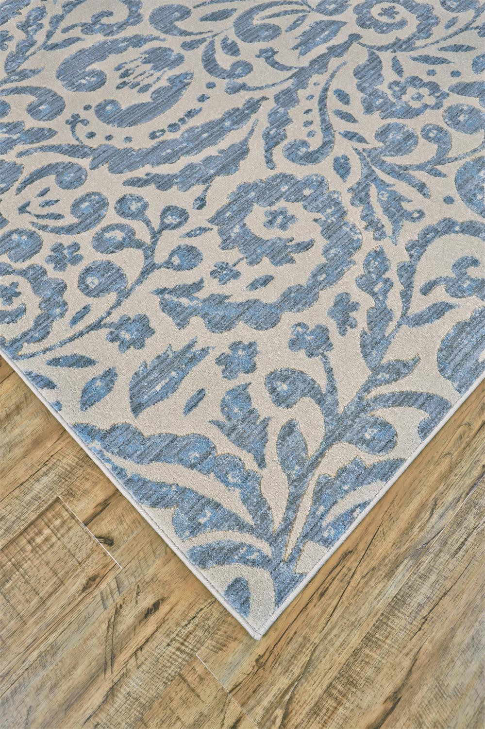 5' X 8' Blue Ivory And Tan Floral Distressed Stain Resistant Area Rug-3