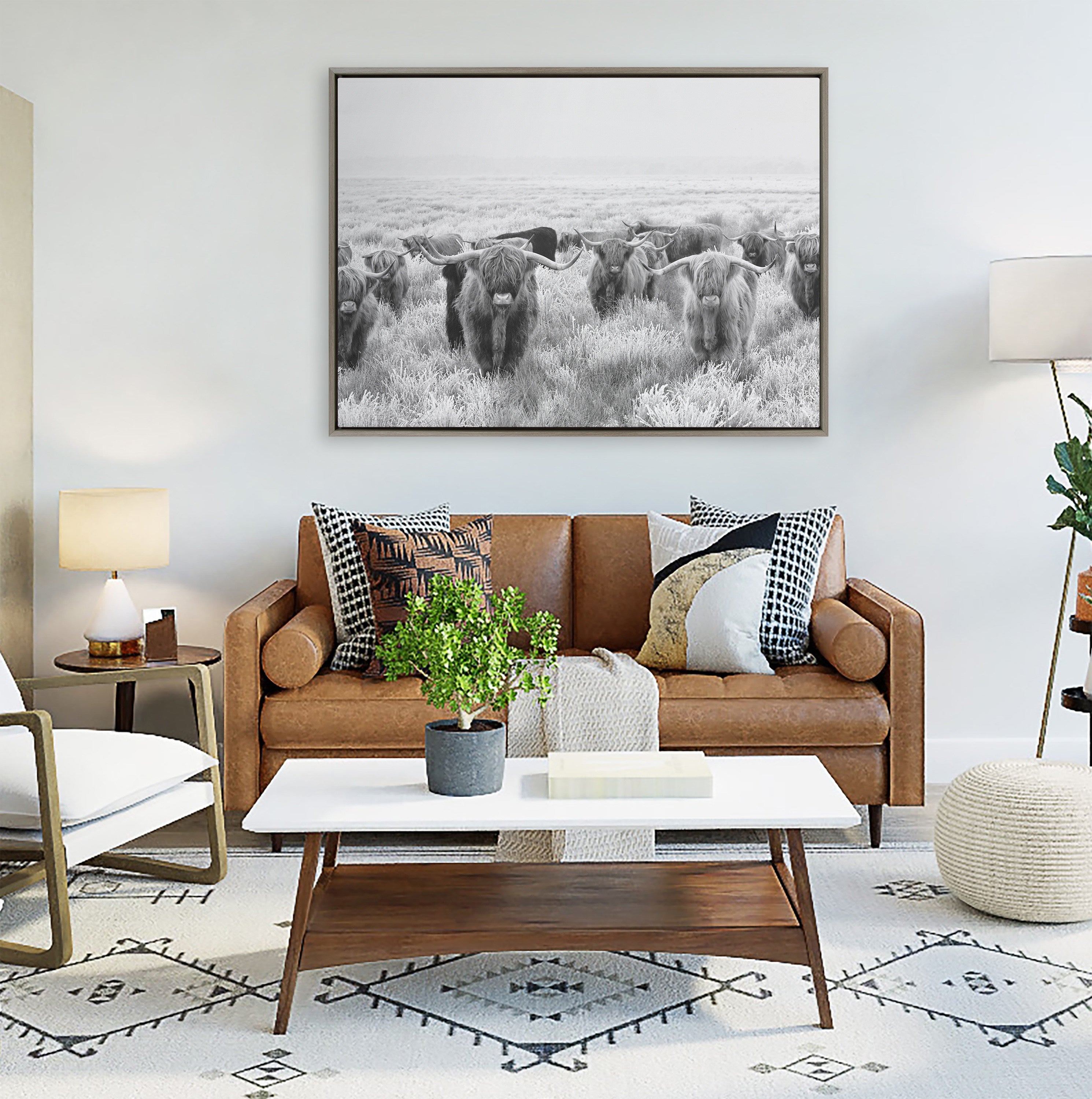 Sylvie Herd of Highland Cows Black and White Framed Canvas by The Creative Bunch Studio