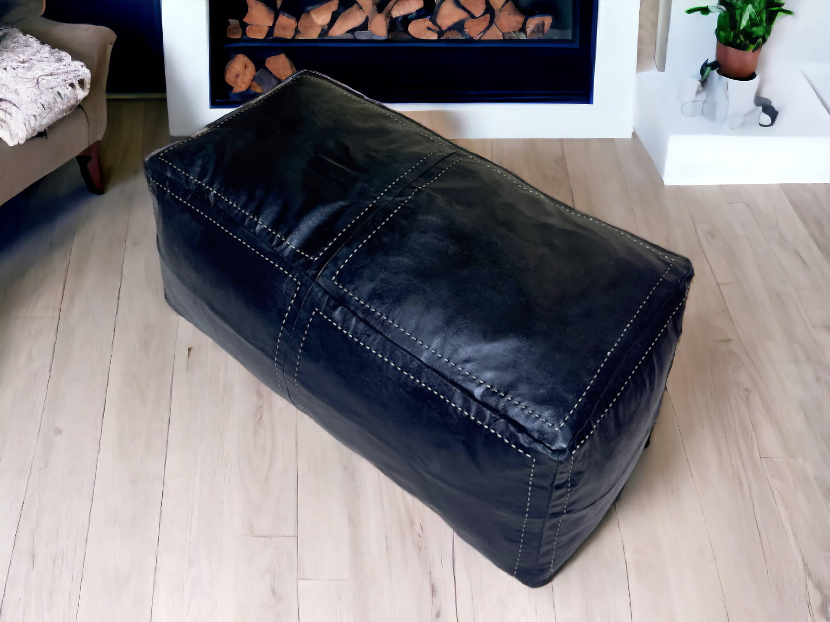 Authentic Moroccan Black Leather Poufs: Handcrafted Elegance by Artisans-1