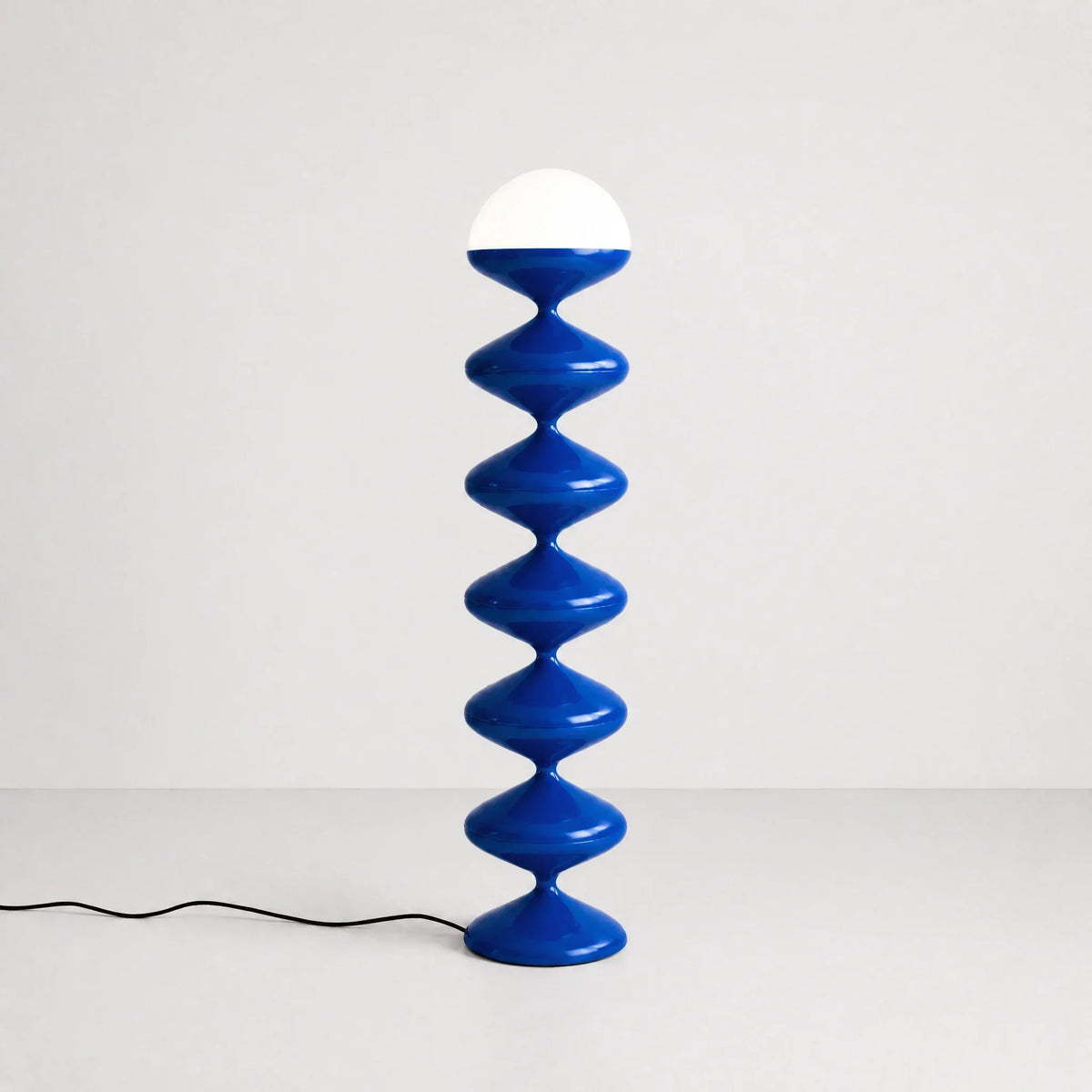 Sculptural Blue Floor Lamp with Stacked Metal Discs | Frosted Dome for Ambient Light