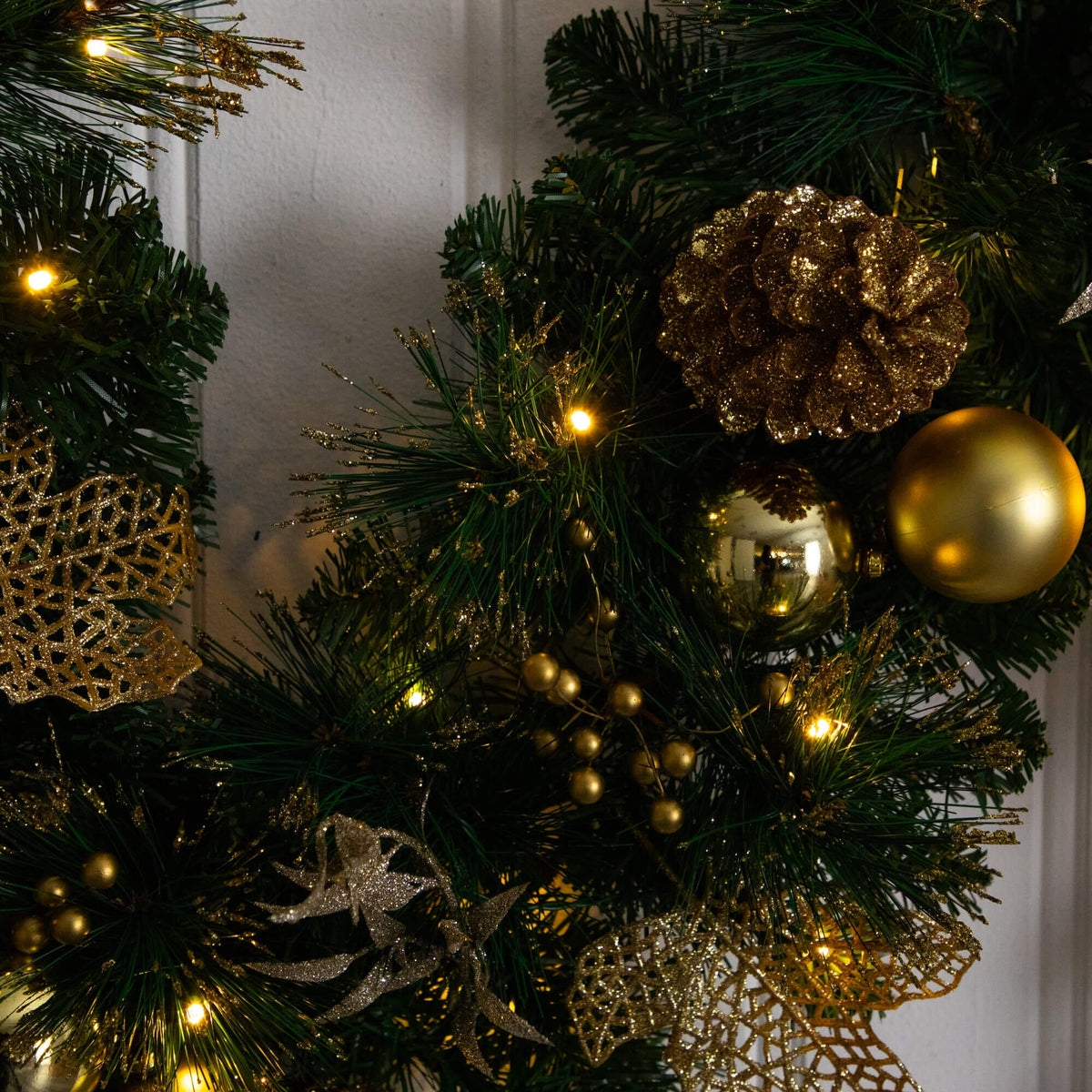 9' Pre-Lit Artificial Golden Frosted Christmas Garland with 50 Warm White LED Lights Pinecones, Berries and Ornaments