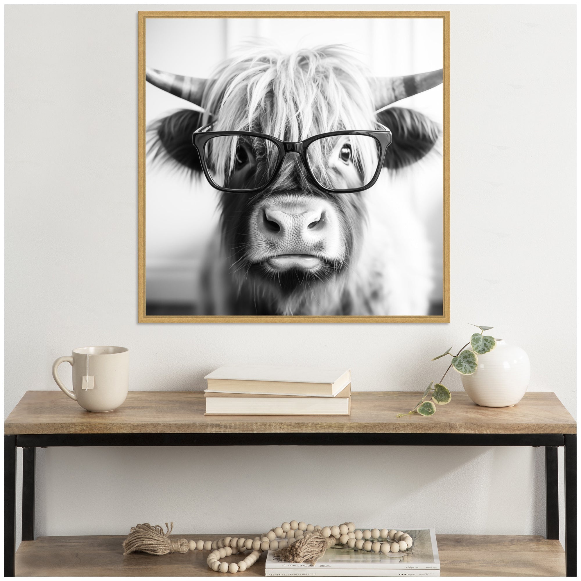 Sylvie Black and White Highland Cow in Reading Glasses Framed Canvas by The Creative Bunch Studio