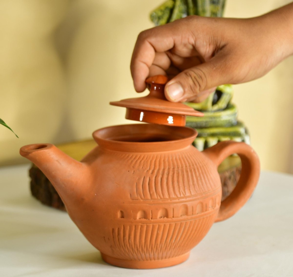 Terracotta Kettle: Artisan Charm for Home and Kitchen-0