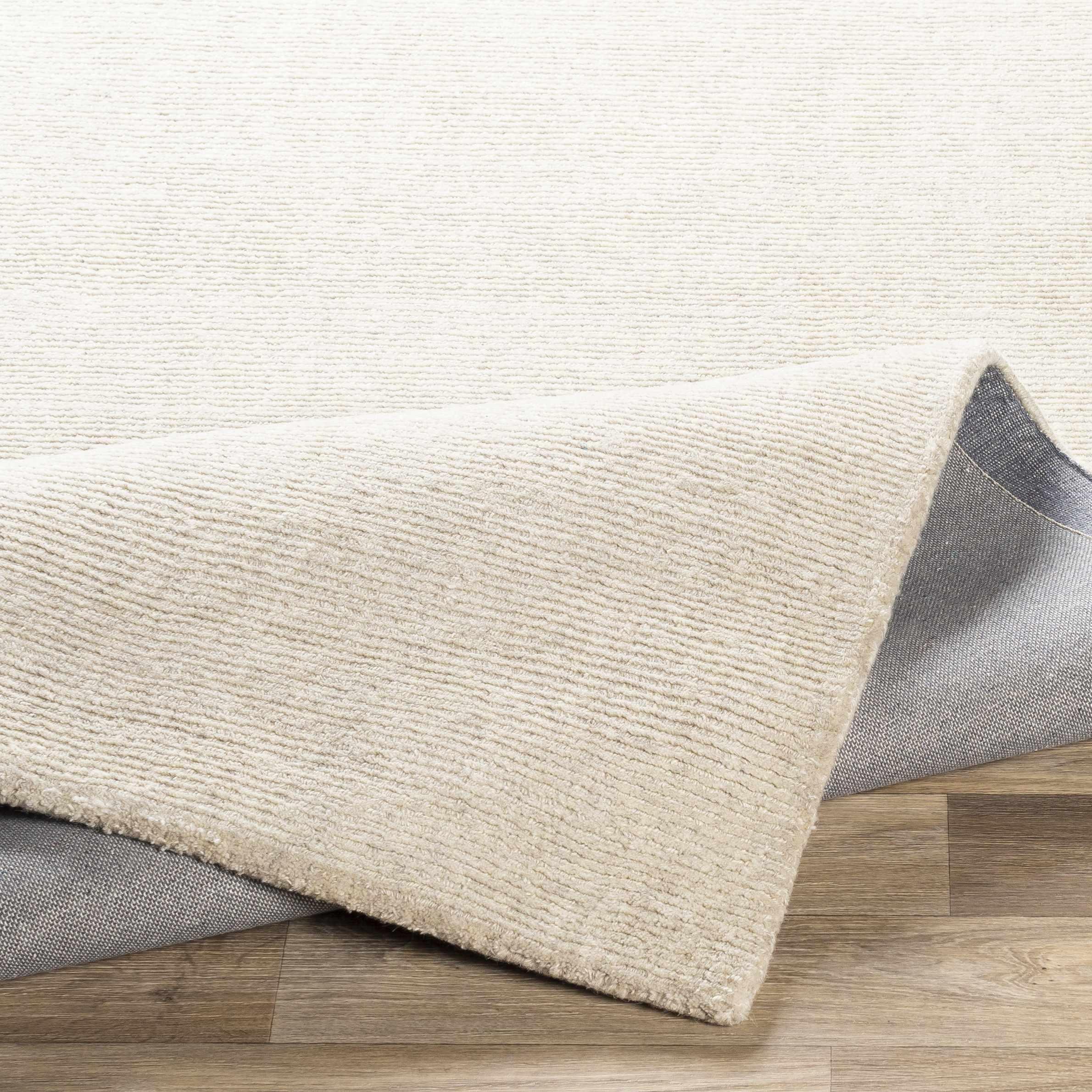 Mariba Ivory Wool Area Rug - PRHOMZ