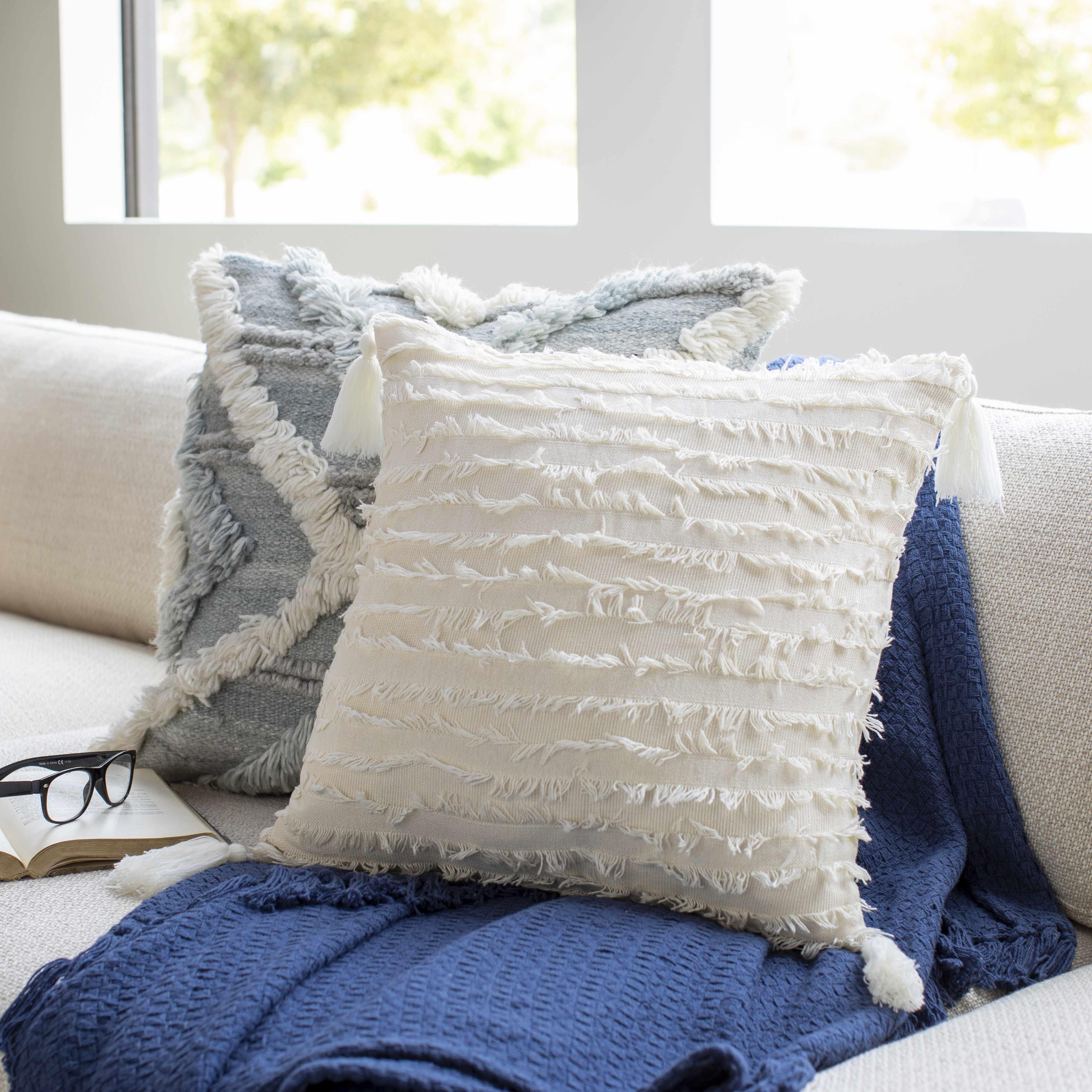 Odon Textured Ivory Tassel Square Pillow - PRHOMZ