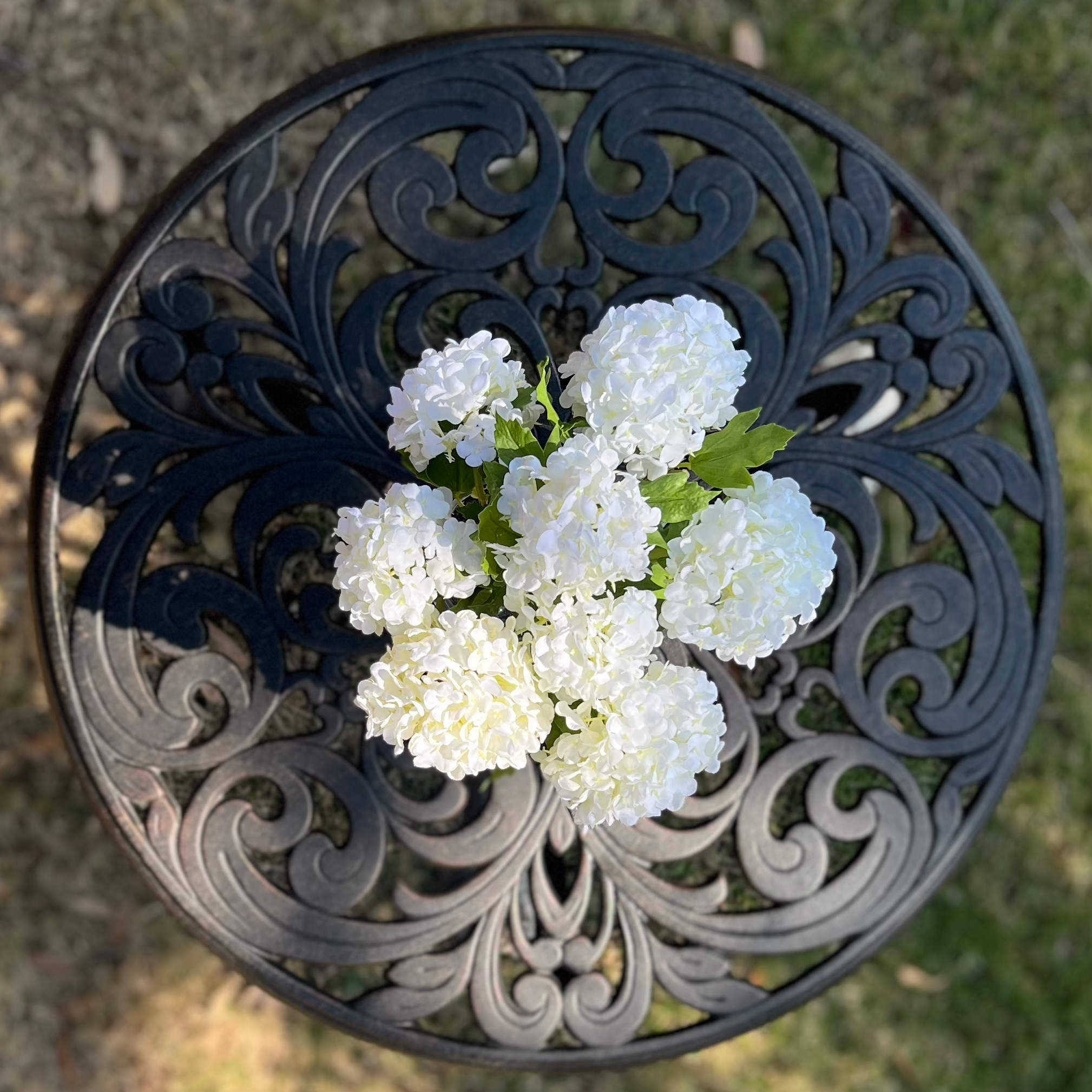 Real touch white hydrangea arrangement in glass vase - 8"